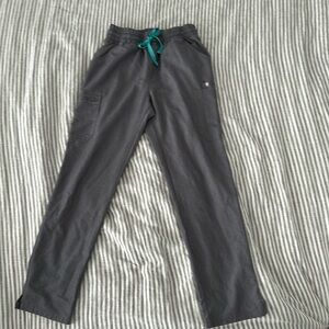 Figs scrub bottoms straight leg with cargo pockets. Size small, regular length.